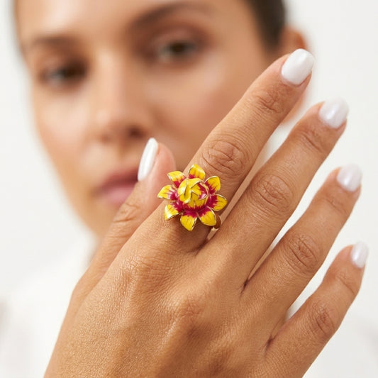 Woman wearing Tranzea gold flower ring